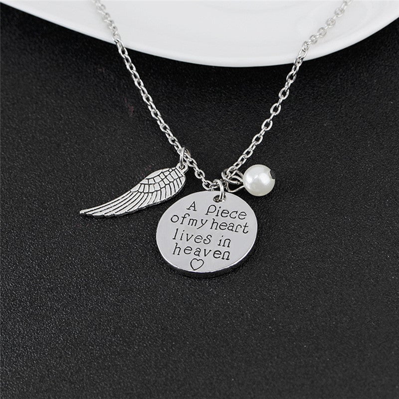 Angel Wing Necklace with Pearl - Engraved Round - "A piece of my heart lives in heaven"