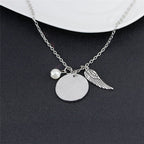 Angel Wing Necklace with Pearl - Engraved Round - "A piece of my heart lives in heaven"