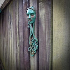 Art Nouveau inspired sculpture of beautiful female face with long stylised hair